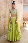 Buy_Saksham & Neharicka_Green Net, Handwoven Chanderi V Neck Embroidered Lehenga Set _at_Aza_Fashions