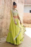 Saksham & Neharicka_Green Net, Handwoven Chanderi V Neck Embroidered Lehenga Set _Online_at_Aza_Fashions