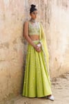 Buy_Saksham & Neharicka_Green Net, Handwoven Chanderi V Neck Embroidered Lehenga Set _Online_at_Aza_Fashions