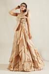 Buy_Adaara Couture_Gold Raw Silk, Net Asymmetric Embellished One Shoulder Lehenga Set _at_Aza_Fashions