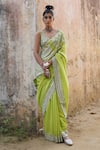Buy_SAKSHAM & NEHARICKA_Green Handwoven Chanderi Embroidered Saree _at_Aza_Fashions