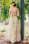 Shop Tarini Vij Green Net Lining Satin Pearl, Sequin, Thread, Cutdana Embroidered Lehenga Set at Aza Fashions Shop_Tarini Vij_Green Net Lining Satin Pearl, Sequin, Thread, Cutdana Embroidered Lehenga Set _at_Aza_Fashions
