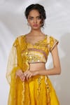 Mehak Murpana Yellow Net, Crepe Leaf Neck Layered Lehenga Set Online at Aza Fashions Mehak Murpana_Yellow Net, Crepe Leaf Neck Layered Lehenga Set _Online_at_Aza_Fashions