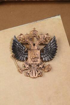 Carved Emblem Brooch