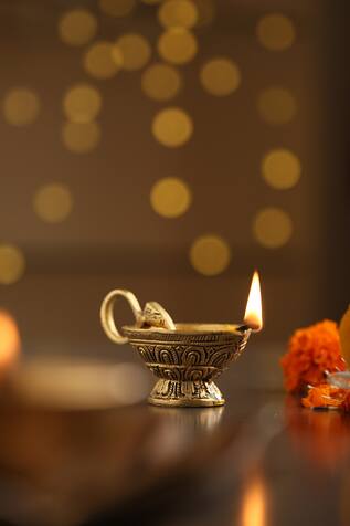 Amoli Concepts Elephant Trunk Carved Diya
