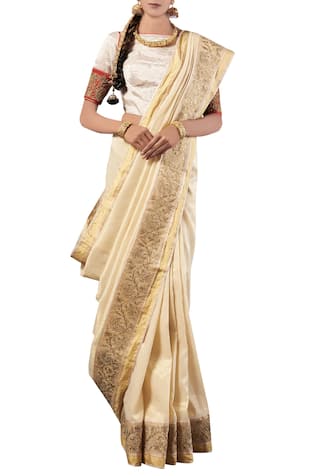 Latha Puttana White golden embroidery silk saree with blouse 