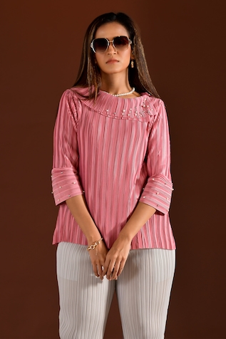 Zahra Ahmad - Blush pink printed lawn pleated peplum top with frilled umbrella  sleeves, embellished laces on bodice and gold lace around flare and sleeves.  Beige cotton plain pleated gharara with silver