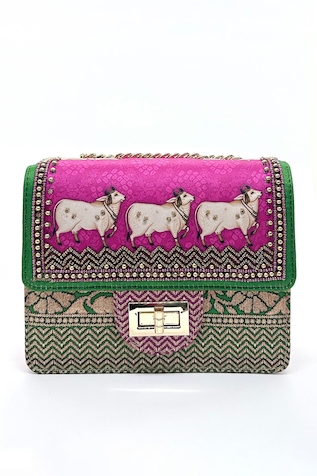The Garnish Company Khillari Cow Print & Woven Sling Bag