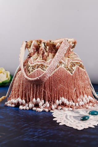 The Tan Clan Asmi Tasseled Potli Bag With Handle 