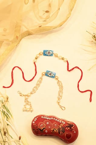 Shlok Jewels Kundan Embellished Lumba & Rakhi Set 