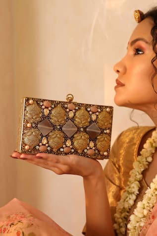 The Tan Clan Arya Floral Carved Clutch 