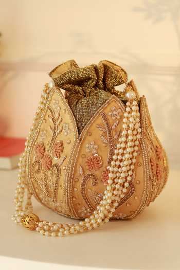 The Tan Clan Baag Gold Lotus Potli 