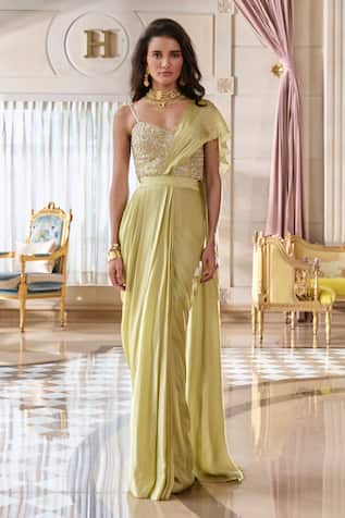 Paulmi And Harsh Pista Green Corset Blouse & Pre-draped Saree 