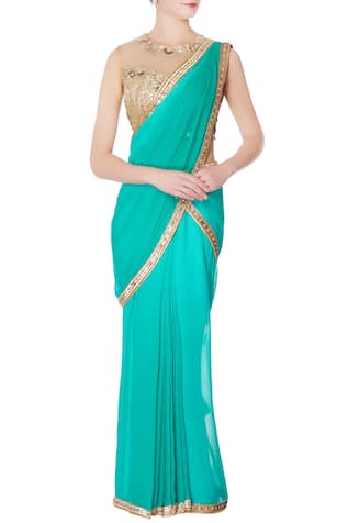 Sea green pre-draped sequin saree with blouse 
