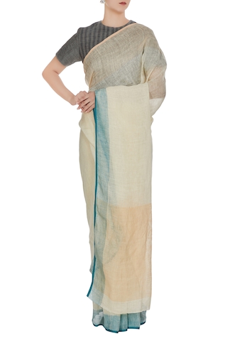 Anavila Beige linen hand woven saree with blue border & unstitched blouse