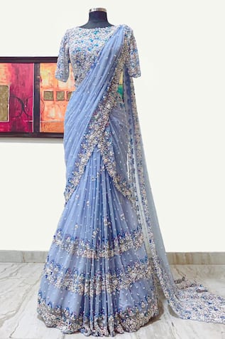 Blue puresilk half-saree with zari buttas,contrast border & blouse of  bogudi,mayil & chakra,intricately designed dhavani