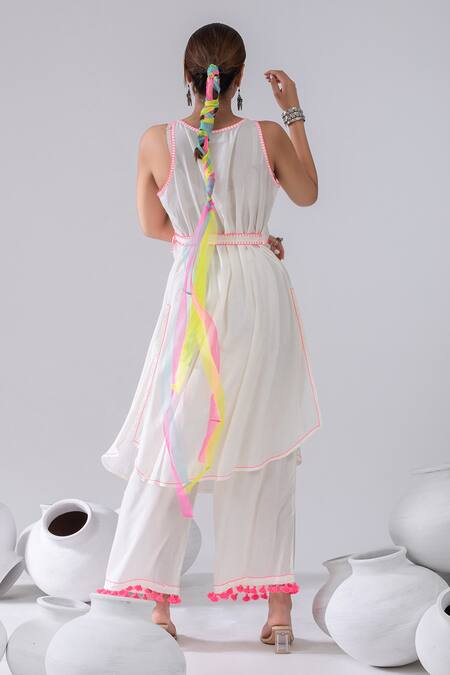 Shop Kacha Tanka Ivory Cotton, Voile Tassels V-neck Thread Embroidered Wrap Kurta And Palazzo Set at Aza Fashions Shop_Kacha Tanka_Ivory Cotton, Voile Tassels V-neck Thread Embroidered Wrap Kurta And Palazzo Set _at_Aza_Fashions
