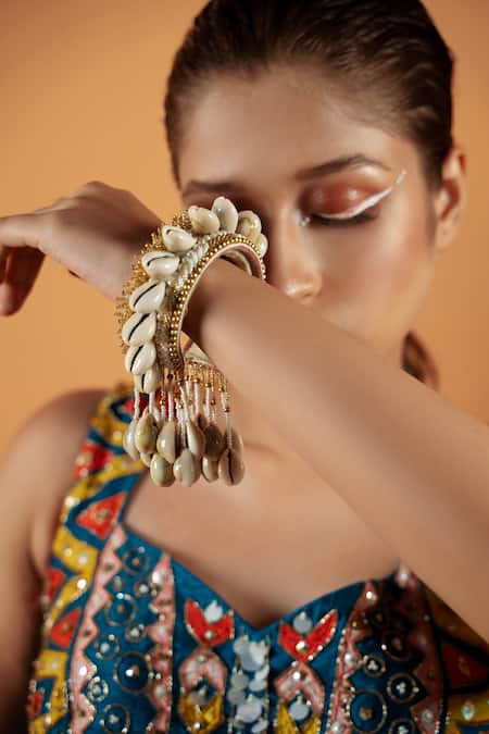 Buy Gold Plated Shell Tassel Bangles Set Of 2 by Kanyaadhan by