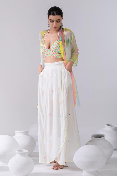 Shop Kacha Tanka Ivory Cotton, Chiffon Pom-poms, Embroidery Plunge Thread Wrap Top Skirt Set at Aza Fashions Shop_Kacha Tanka_Ivory Cotton, Chiffon Pom-poms, Embroidery Plunge Thread Wrap Top Skirt Set _at_Aza_Fashions