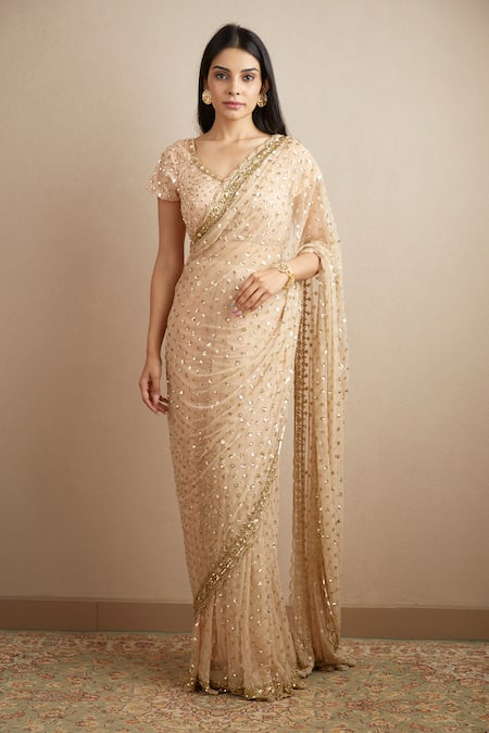 Buy_ASTHA NARANG_Peach Net, Crepe Sequins, Embroidery Scoop Neck Sitara Saree With Blouse _Online_at_Aza_Fashions