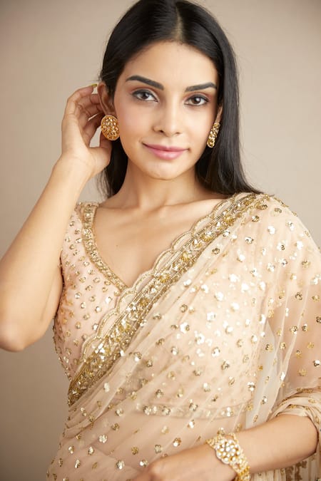 ASTHA NARANG_Peach Net, Crepe Sequins, Embroidery Scoop Neck Sitara Saree With Blouse _at_Aza_Fashions