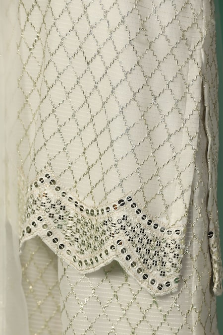 Two Sisters By Gyans White Georgette, Net Sequins, Gota Geometric Embroidered Kurta Sharara Set at Aza Fashions Two Sisters By Gyans_White Georgette, Net Sequins, Gota Geometric Embroidered Kurta Sharara Set _at_Aza_Fashions