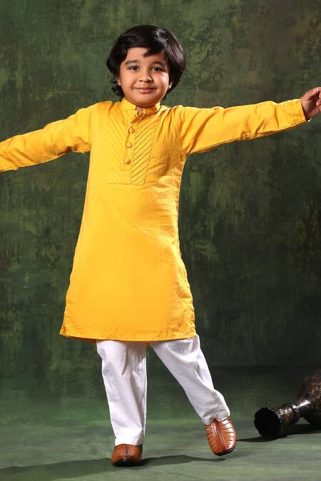 Shop Littlecheer Yellow Cotton Satin Pintuck Kurta And White Pyjama Set Online at Aza Fashions Shop_Littlecheer_Yellow Cotton Satin Pintuck Kurta And White Pyjama Set _Online_at_Aza_Fashions