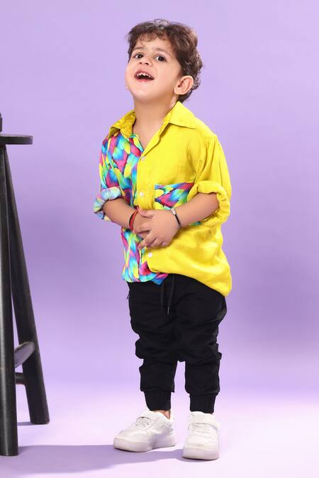 Littlecheer Multi Color Viscose, Satin Feathers Print Roll-up Sleeve Shirt Online at Aza Fashions Littlecheer_Multi Color Viscose, Satin Feathers Print Roll-up Sleeve Shirt _Online_at_Aza_Fashions