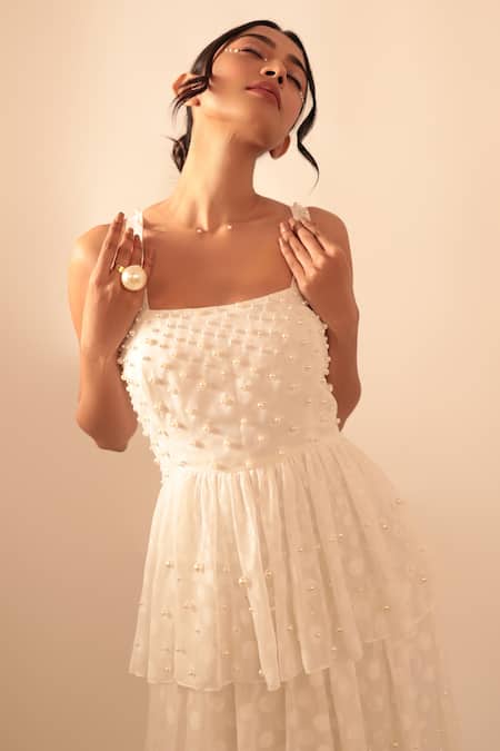 Shop Vanshika Agarwal Label White Cotton, Taffeta Pearls Square Neck Embroidered Ruffle Layer Gown Online at Aza Fashions Shop_Vanshika Agarwal Label_White Cotton, Taffeta Pearls Square Neck Embroidered Ruffle Layer Gown _Online_at_Aza_Fashions