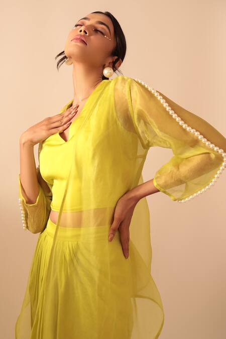 Buy Vanshika Agarwal Label Yellow Organza, Modal, Taffeta Pearls V-neck Neon Jacket And Draped Skirt Set Online at Aza Fashions Buy_Vanshika Agarwal Label_Yellow Organza, Modal, Taffeta Pearls V-neck Neon Jacket And Draped Skirt Set _Online_at_Aza_Fashions