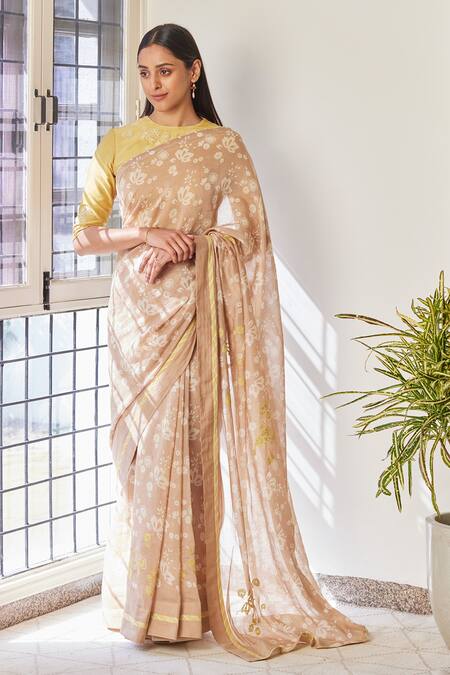 Buy Vaayu Beige Cotton, Muslin Embroidery Floral Discharge Print Saree at Aza Fashions Buy_Vaayu_Beige Cotton, Muslin Embroidery Floral Discharge Print Saree_at_Aza_Fashions