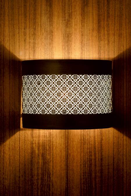 Shop Courtyard Gold Metal Ajrakh Jaali Work Pattern Round Wall Lamp at Aza Fashions Shop_Courtyard_Gold Metal Ajrakh Jaali Work Pattern Round Wall Lamp_at_Aza_Fashions