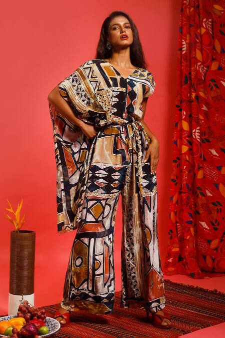 Buy Label Shristi Chetani Multi Color Natural Crepe Digital V Neck One-sided Draped Jumpsuit at Aza Fashions Buy_Label Shristi Chetani_Multi Color Natural Crepe Digital V Neck One-sided Draped Jumpsuit_at_Aza_Fashions