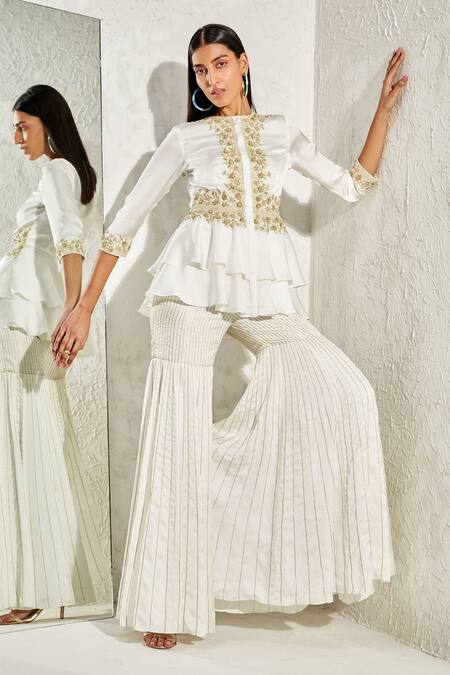 Namrata Joshipura_Ivory Satin Embroidery Round Neck Belladonna Embellished Peplum And Sharara Set_Online_at_Aza_Fashions