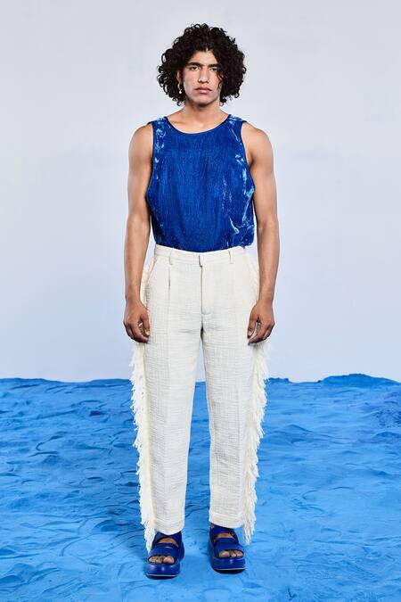 Buy Triune White Handloom Cotton Fringes Desert Pant at Aza Fashions Buy_Triune_White Handloom Cotton Fringes Desert Pant_at_Aza_Fashions