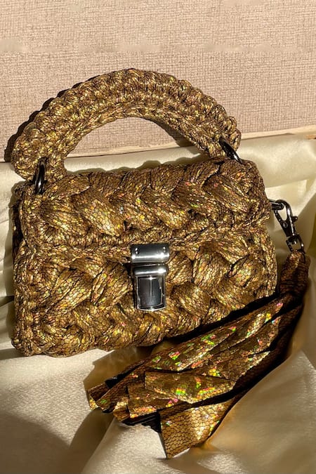 Shop Bijit Gold Tassels Snake Pattern Metallic Sling Bag at Aza Fashions Shop_Bijit_Gold Tassels Snake Pattern Metallic Sling Bag _at_Aza_Fashions