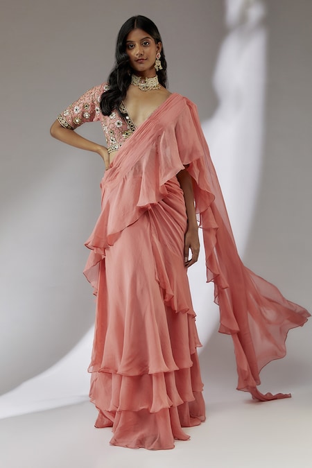 Peach ruffle saree Design by Devika Seth at Modvey