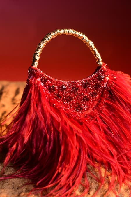 Shop Be Chic Red Embellished Fiery Moon Shaped Clutch at Aza Fashions Shop_Be Chic_Red Embellished Fiery Moon Shaped Clutch _at_Aza_Fashions