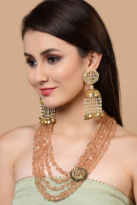 Shop Dugran By Dugristyle Cream Pearl Embellished Long Jhumkas at Aza Fashions Shop_Dugran By Dugristyle_Cream Pearl Embellished Long Jhumkas _at_Aza_Fashions