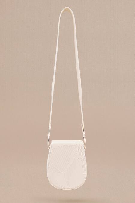 Buy Ampm Ivory Embroidery Zyna Peacock Embossed Sling Bag at Aza Fashions Buy_Ampm_Ivory Embroidery Zyna Peacock Embossed Sling Bag_at_Aza_Fashions