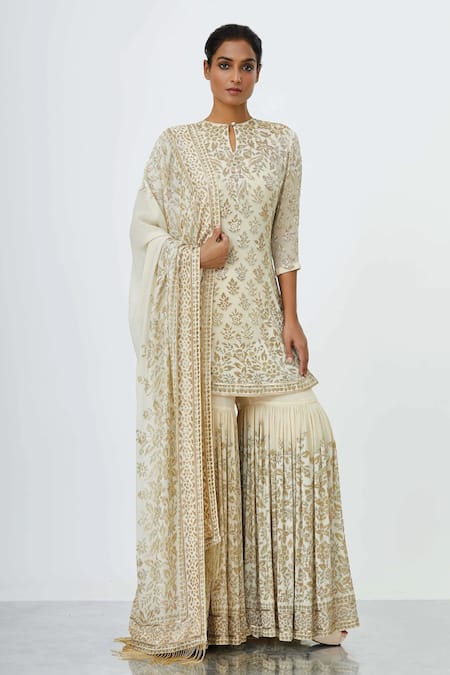 Buy Nakul Sen Ivory Chiffon Embroidery, Cut Work Keyhole Floral Cutdana Kurta Sharara Set at Aza Fashions Buy_Nakul Sen_Ivory Chiffon Embroidery, Cut Work Keyhole Floral Cutdana Kurta Sharara Set_at_Aza_Fashions