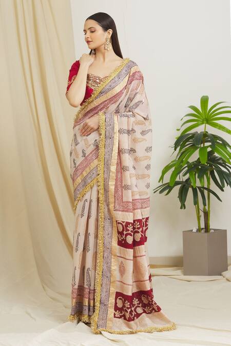 Surendri_Ivory Raw Silk, Kotadoria Floral Sweetheart Saree With Back Tassel Tie-up Blouse_Online_at_Aza_Fashions