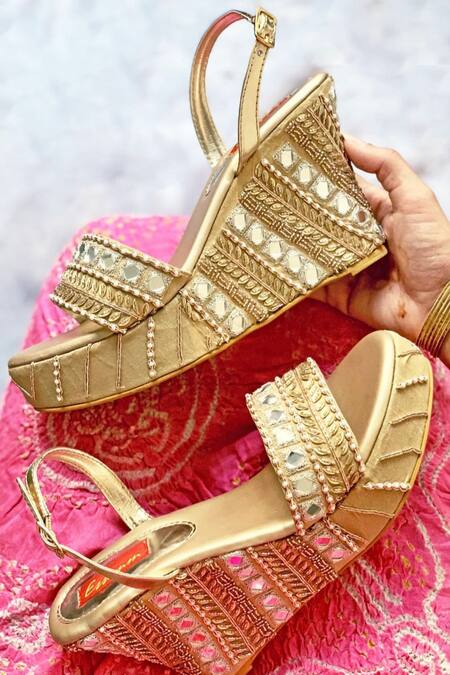 Shop Essemm Gold Embroidered Reva Embellished Wedges at Aza Fashions Shop_Essemm_Gold Embroidered Reva Embellished Wedges_at_Aza_Fashions