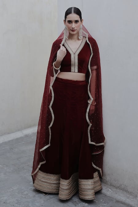 Shrutkirti Red Silk Velvet Embellished V Neck Zoya Lehenga Set 