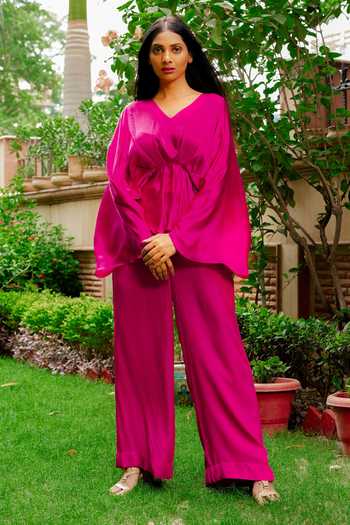 Buy Omana By Ranjana Bothra Pink Satin V-neck Cowl Sleeve Top And Wide Legged Trouser Set at Aza Fashions Buy_Omana By Ranjana Bothra_Pink Satin V-neck Cowl Sleeve Top And Wide Legged Trouser Set _at_Aza_Fashions