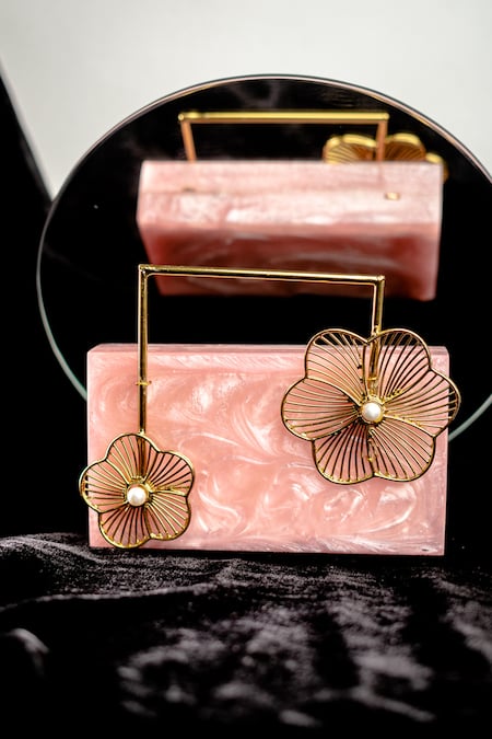 Buy Pink Carved Floral Motif Resin Clutch Bag by NR BY NIDHI RATHI