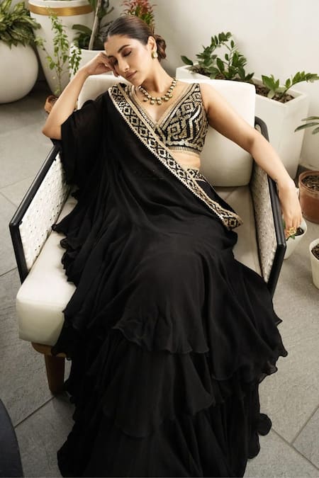 Ramya Subramanian in a black color saree, sleeveless blouse design and  necklace | Stylish sarees, Indian silk sarees, Saree trends