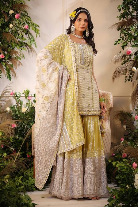 Buy Bairaas Yellow Mulmul Print Khari Round Neck Diamond And Gota Work Kurta Set at Aza Fashions Buy_Bairaas_Yellow Mulmul Print Khari Round Neck Diamond And Gota Work Kurta Set_at_Aza_Fashions