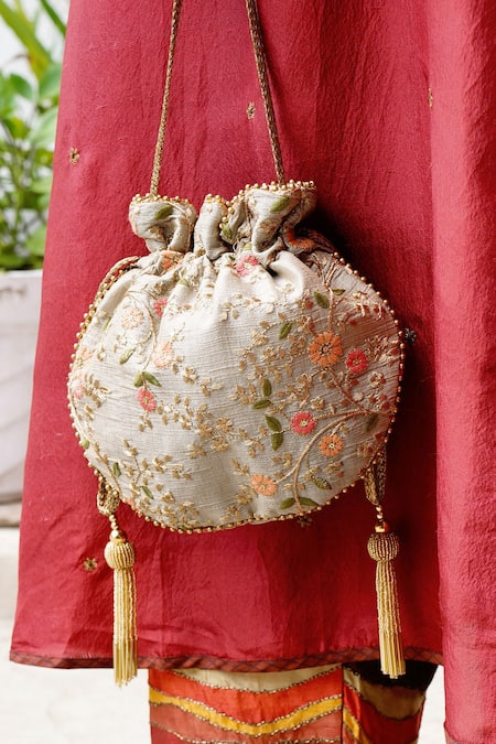Buy Light green embroidered potli bag by Amyra at Aashni and Co