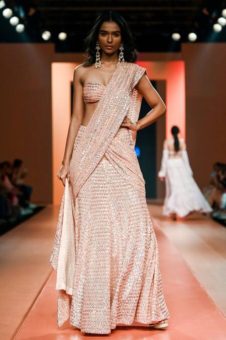 The saree is a quintessential piece... - Lakme Fashion Week | Facebook